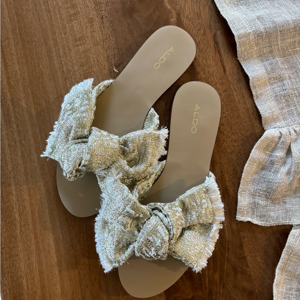 ALDO Flat Sandals with Gold Bow